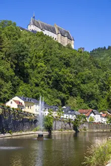 Luxembourg, Vianden, View of Vianden Castle above the town and Our River