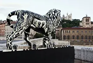 Waterways Prints: Lyon, France; A lion statue on a bridge over the Saone in Lyon France