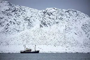 Svalbard Prints: M/S Stockholm, a small tourist ship, with snowy mountain behind, Svalbard, Norway
