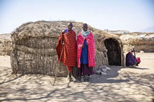 Maasai people in front of their home, Kajiado County, Kenya
