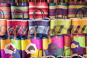 Madagascar, The coloured hand made straw bags typical of Madagascar