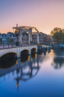 Amsterdam Gallery: Magere brug at dusk reflecting in the Amstel canal in Amsterdam, Holland / Netherlands