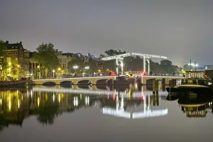 Bascule Bridge Prints: Magere Brug over the river Amstel illuminated at night on foggy evening, Amsterdam