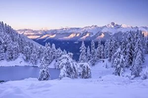 Lombardy Gallery: The magic of the first lights on the snowy peaks of the Reathian alps and Mount Disgrazia