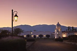 Wine Route Prints: The main facade of the Bodega El Esteco'winery at sunrise, Cafayate