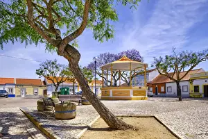 The main square of the fishing village of Rosario with the traditional bandstand, Moita