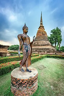 Brick Prints: Main stupa and statue of the Walking Buddha in the green gardens of Wat Sa Si