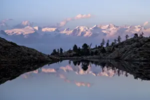 Natural Park Prints: The majestic glaciers in the Mount Rosa range reflecting in the water of Lake Bianco