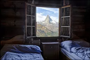 Majestic Matterhorn peak seen from bedroom window of Fluhalp hut hotel, Zermatt