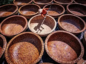 Craft Prints: Making of traditional bamboo basket boats, Tuy An, Phu Yen province, Vietnam. (MR)
