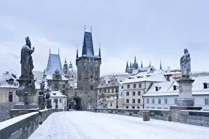 Images Dated 20th January 2021: Mala Strana Bridge Tower at snow-covered Charles Bridge in winter, Prague, Bohemia