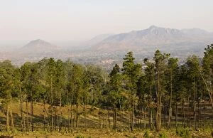 Images Dated 12th August 2011: Malawi, Zomba. View over the town of Zomba from the lower slopes of Zomba Plateau where once there