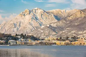 Lecco Prints: Malgrate village framed by the snowy peaks of Monte Rai and Corno Birone, Malgrate