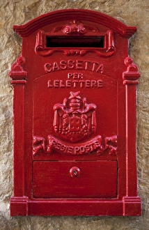 Malta, Europe; A coloured letter box, normally found in village or town cores Malta, Europe; A coloured letter box, normally found in village or town cores