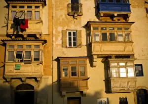 Maltese Islands Prints: Malta, Europe; Traditional Maltese balconies in the last light of the day in Valletta
