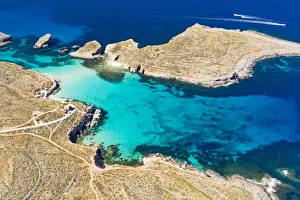 Malta, Gozo Region, Comino. Aerial view of the azure coloured waters of the Blue