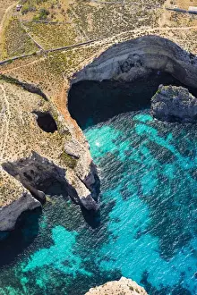Maltese Islands Prints: Malta, Gozo Region, Comino. Aerial view of the azure coloured waters of the Blue