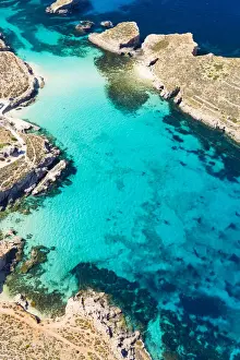 Malta, Gozo Region, Comino. Aerial view of the azure coloured waters of the Blue Lagoon