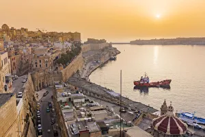 Images Dated 15th June 2017: Malta, South Eastern Region, Valletta. The entrance to Grand Harbour at sunrise