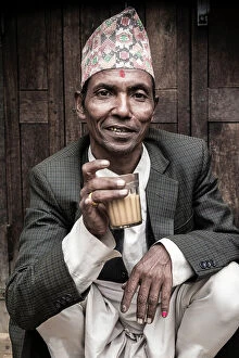 Images Dated 14th September 2023: Man drinking tea at Asan Bazaar, Kathmandu, Nepal