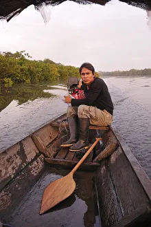 Amazon Prints: Man in dugout canoe on the Lago de Tarapoto, Amazon River, near Puerto Narino, Colombia
