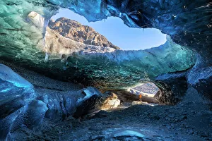 Vatnajokull Prints: Man in an ice cave of Breidamerkurjokull, Austurland, Iceland