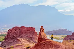 Exploration Prints: Man looking at rock formations, Quebrada de las Conchas, Salta, Argentina. (MR)