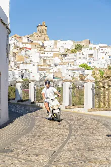 Scooter Prints: Man riding a scooter, Arcos de la Frontera, Andalusia, Spain