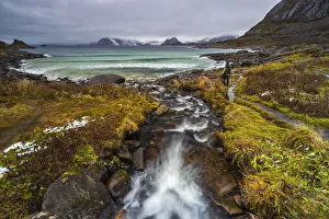 Norge Prints: A man at Rorvikstranda beach in a moody day