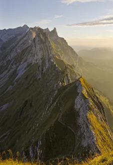 Wasserauen Prints: A man at Schafler ridge at sunset during summer, Wasserauen, Canton Appenzell Innerrhoden