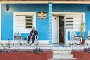 Images Dated 29th May 2020: A man sitting outside his casa in Vinales, Pinar del Rio Province, Cuba