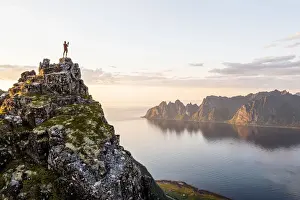 Technology Prints: Man with smartphone photographing the Okshornan rocky peaks (Devil')