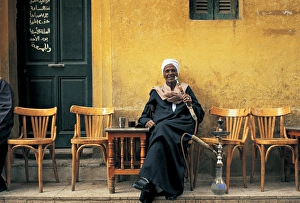 Luxor Prints: Man smoking Sheesha, Luxor, Egypt