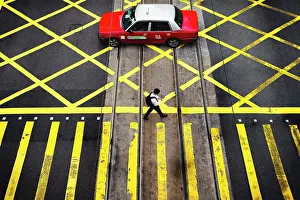 Taxi Prints: A man and a taxi on pedrestian crossing, Central, Hong Kong, China
