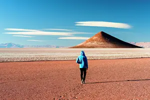 Walk Prints: Man walking toward Arita Cone, Salar de Arizaro, Tolar Grande, Puna, Argentina. (MR)