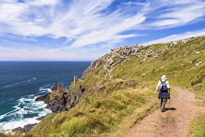 Walker Prints: A man walking near Botallack Mine, Penzance, Cornwall, England, UK