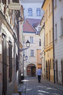 Bratislava Prints: Man walking along street in Old Town, Bratislava, Slovakia