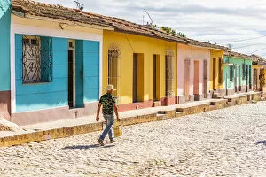 Cuban Gallery: A man walking in a street in Trinidad, Sancti Spiritus, Cuba