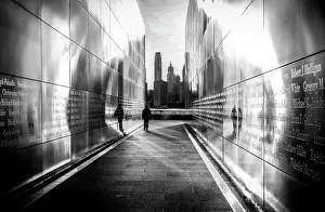 Jersey City Prints: Man walking between the walls of the Empty Sky Memorial