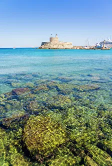Images Dated 10th January 2023: Mandraki Marina and Port looking towards Saint Nicholas Fortress, Rhodes Town, Rhodes