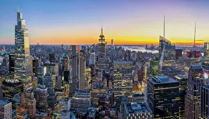 One Vanderbilt Prints: Manhattan Skyline View with the Empire State Building illuminated at sunset Manhattan