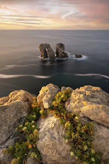 Long Exposure Prints: Manzano rocks during a warm summer sunset, Bajos de Arnia, Cantabria, Spain