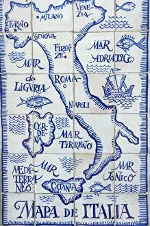 Map of Italy and the Mediterranean made out of ceramic tiles on a street in Seville