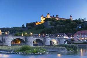 Marienberg Fortress and Old Main Bridge at dusk, Wurzburg, Bavaria, Germany