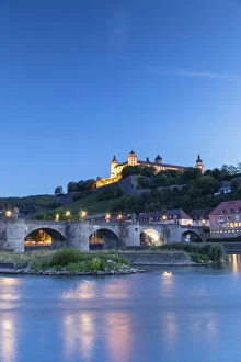Images Dated 11th October 2018: Marienberg Fortress and Old Main Bridge at dusk, Wurzburg, Bavaria, Germany