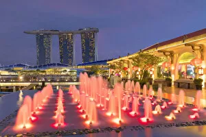 Images Dated 9th March 2017: Marina Bay Sands Hotel and Fullerton Bay Hotel at dusk, Marina Bay, Singapore