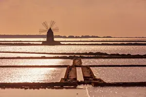 Saltern Prints: Marsala, Sicily. Windmills reflecting at sunset in the saltern between Marsala