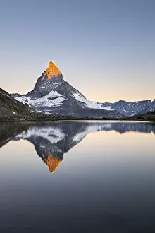 Matterhorn reflected in Riffelsee Lake at dawn (Zermatt, Canton of Valais, Visp