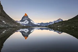 Matterhorn reflected in Riffelsee Lake at dawn (Zermatt, Canton of Valais, Visp