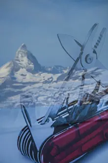 Advert Prints: Matterhorn reflected in window of Gornergrat hotel shop window, Zermatt, Valais